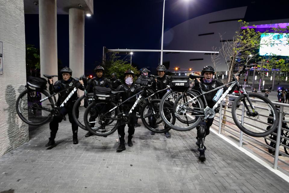 Police use bikes as weapons during protests