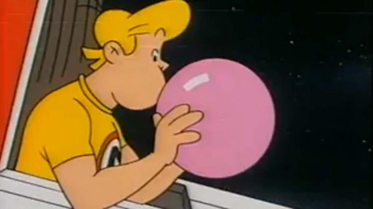 Source : https://static.europe1.fr/var/europe1/storage/styles/image_750_422/public/media/image/2025/02/21/21/chewing-gum-la-bulle-a-eclate.jpg Bonhomme de la publicité pour chewing-gum Malabar soufflant une grosse bulle rose